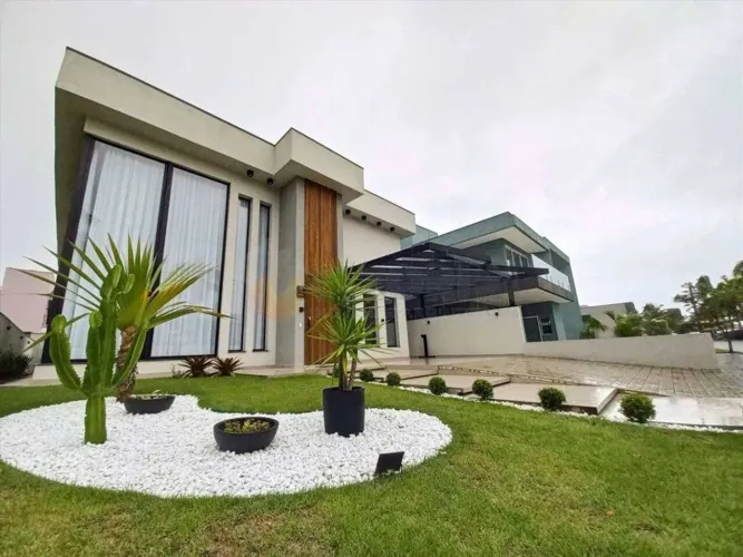 Sobrado à venda em Caraguatatuba, Costa Nova, com 4 quartos, 357m²