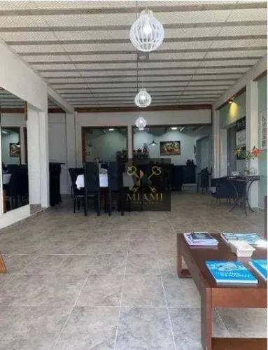 Casa com 5 dormitórios à venda, 233 m² por R$ 1.160.000 - Coroados - Guaratuba/Paraná