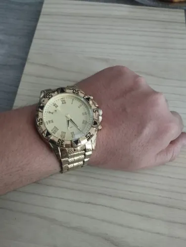 Relógio Masculino funcionando perfeitamente R$80 Reais 