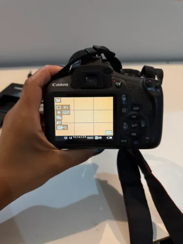 Canon t7 + bateria e carregador original + cartão sd sandisk 32 gb + capa da câmera