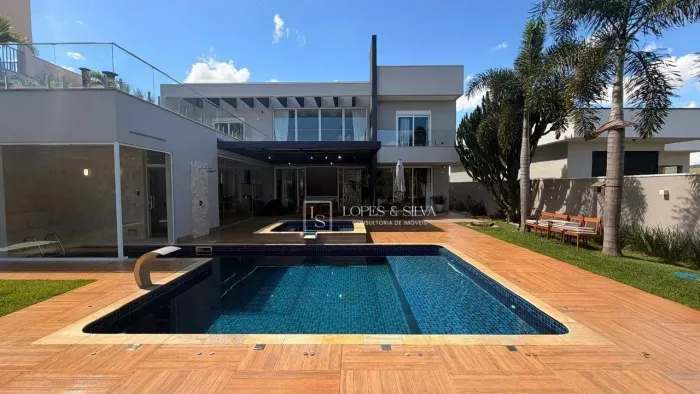 Casa com 4 dormitórios à venda, 551 m² por R$ 5.200.000 - Condomínio Figueira Garden - Ati