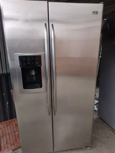 Vendo geladeira Profile troco por uma tv e o restante em dinheiro 