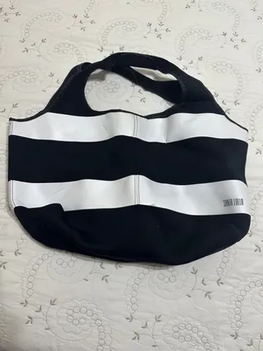 Bolsa Santa lolla original com necessaire nova