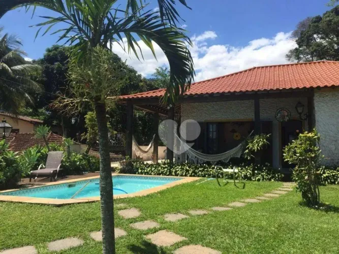 Casa com 5 quartos, 382 m², à venda por R$ 1.950.000 - Mangaratiba