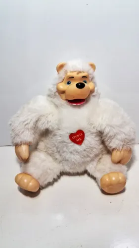 Macaco de Pelucia -bate palma ele toca musica