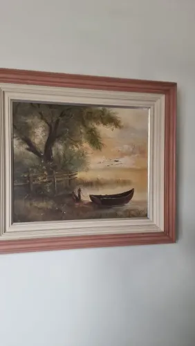 Vendo esse lindo quadro desse barco nessa linda paisagem, pequena avaria na pintura (ceu t
