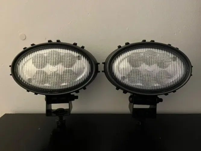 Par de faróis HELLA 12v