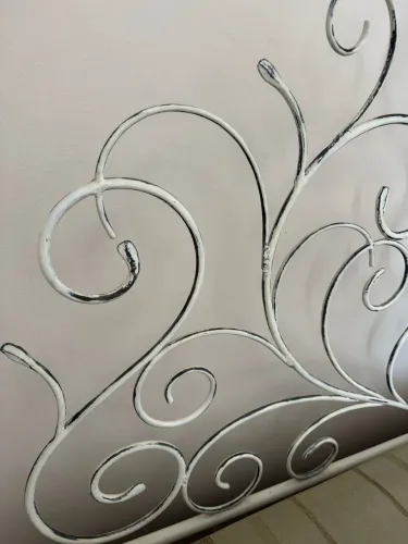 Cama antiga de ferro