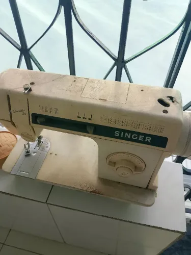 Máquina de costura singer