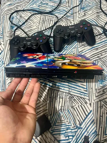 VENDO PS2 EM PERFEITO ESTADO, DOIS CONTROLES, PENDRIVE 128G, MEMORY CARD 8MB, NUNCA ABERTO