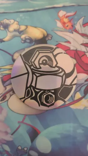 moeda melmetal - original oficial pokémon