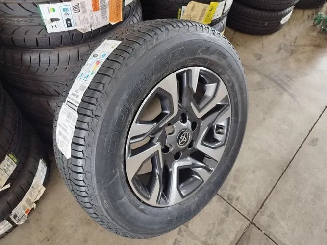 ESTEPE HILUX SW4 2023 C/ PNEU ZERO BRIDGESTONE