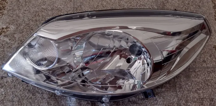 Farol Dianteiro esquerdo Renault Sandero ano 2012 A 2014 novo Novo