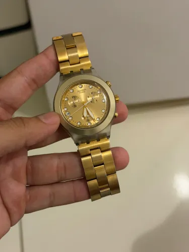 Swatch feminino ouro 