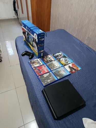 PlayStation 4 Slim 500gb +1 controle e 9 jogos