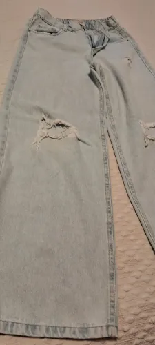 Calça jeans desfiada