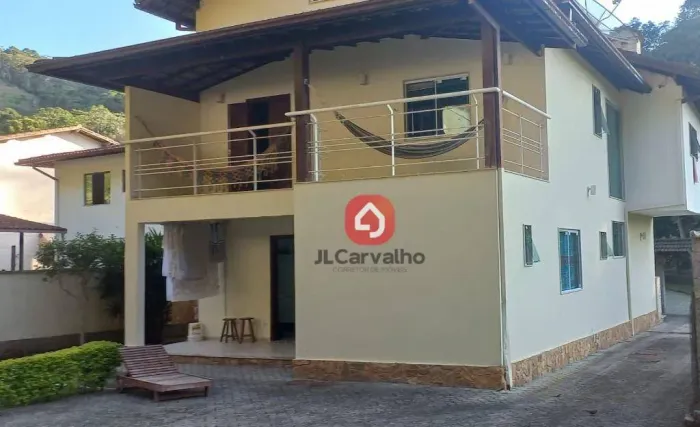 Casa com 4 dormitórios à venda, 576 m² por R$ 1.300.000,00 - Chácara Paraíso - Nova Fribur