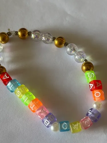Pulseira de miçangas escrito ?São João Batista?