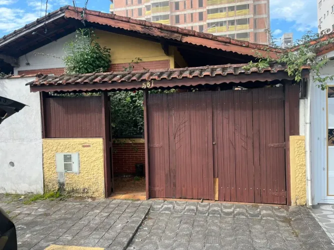 Casa com 2 dormitórios à venda, 68 m² por R$ 430.000,00 - Vila Guilhermina - Praia Grande/