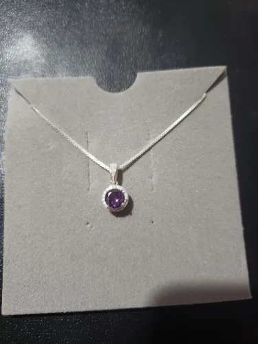 Corrente prata 925 com zirconia azul ou lilás.