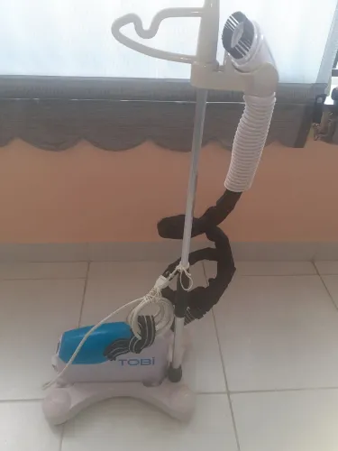 Tobi passa roupa 