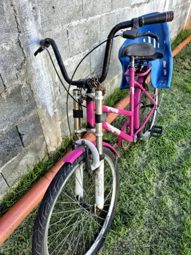 Bicicleta Poty Aro 26 com cadeirão infantil.