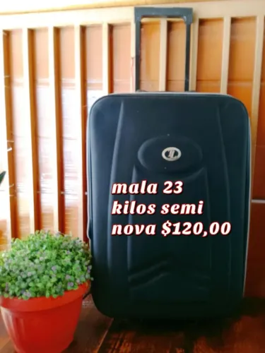 Mala 23 kilos semi nova 