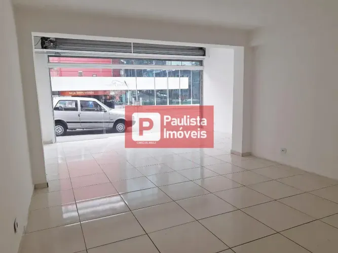Sobrado comercial, com loja , mais 6 salas, 3 banheiros, quintal, porta de aço automatizad