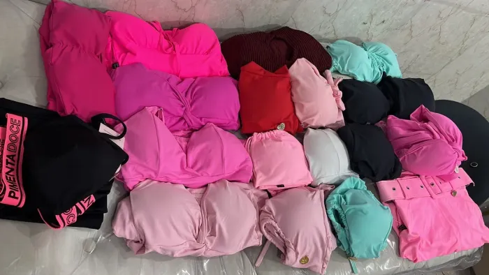 Lote roupas faixa rosa