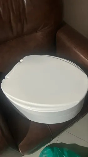Assento sanitário elevatório