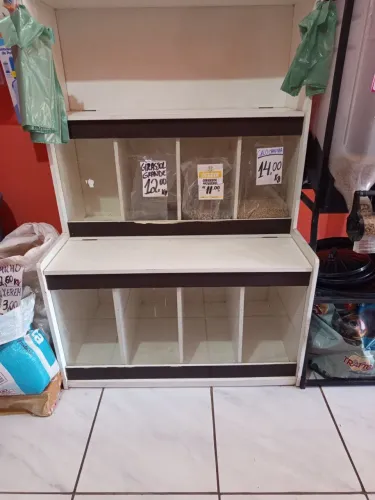Vendo dispense,de madeira para ração ou semente de pássaros....