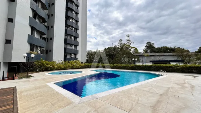 APARTAMENTO COM 3 QUARTOS SENDO 1 SUITE, CHURRASQUEIRA, 2 VAGAS DE GARAGEM NO BAIRRO ATIRA