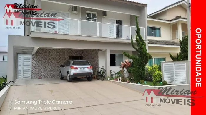 sobrado a venda em Peruibe com 4 suites , espaço gourmet, piscina em condomínio fechado em