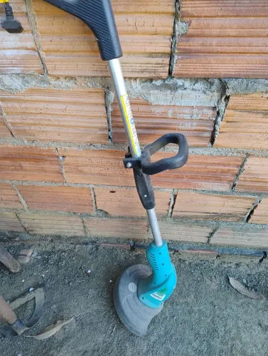 COSTADOR DE GRAMA 