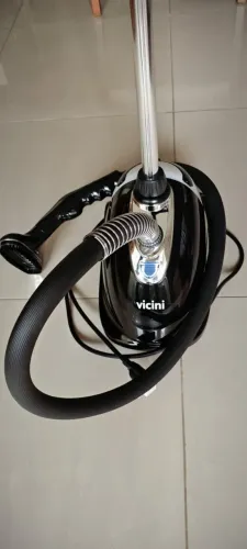 Vaporizador de roupas e tecidos