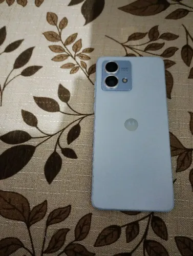 Motorola G 84 G5 com a caixa semi novo com um ano , de uso carregador, nota fiscal côr az
