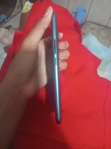 Vendo moto E 7 valor de 250,00 funcionando tudo,sem trinco com película e capa