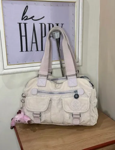bolsa kipling defea original