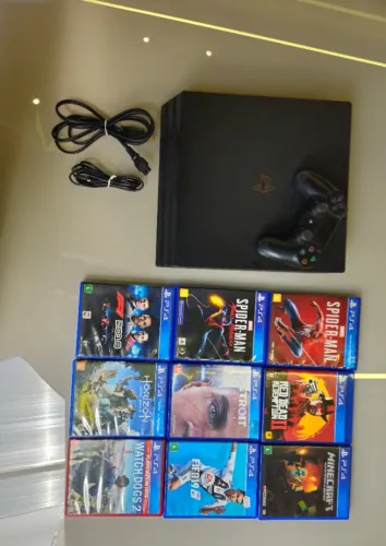 PlayStation 4 Pro 1TB 4K (Pouco Uso) + 9 Jogos em Mídia Física (CD's) + 1 Controle Origina