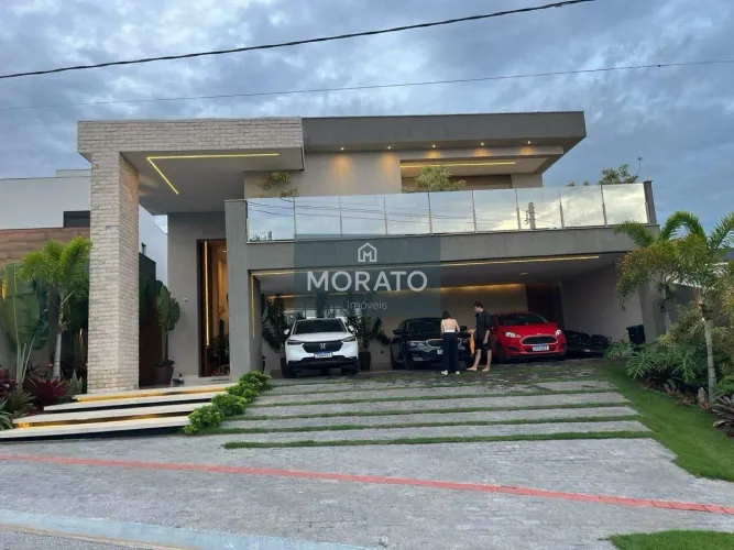 Casa com 4 quartos sendo 3 suítes com 3 vagas de garagem no condomínio Portal do Sol.