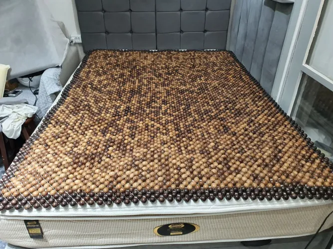 Massageador de corpo para cama de casal.