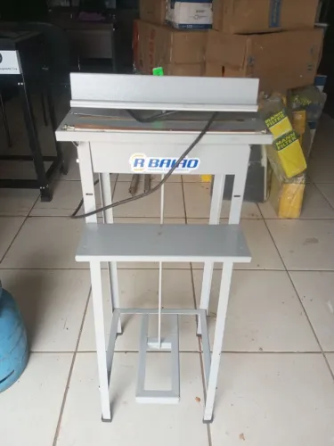 Máquina de selar