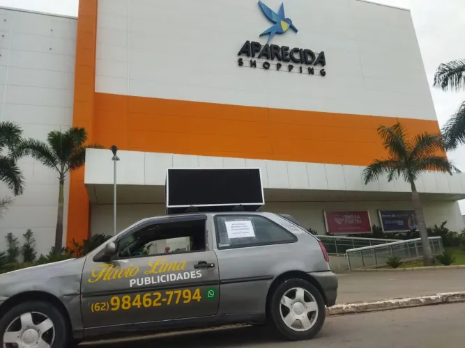 Carro propaganda publicidade locução porta de loja 