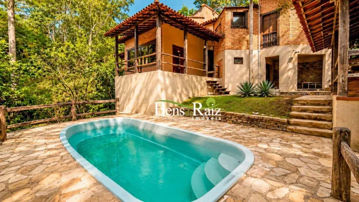 Casa com 3 dormitórios à venda, 259 m² por R$ 1.590.000,00 - Ville de Montagne - Nova Lima