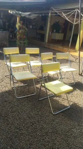 Jogo de cadeiras  antigas de ferro com estofado amarelo . Originais anos 80