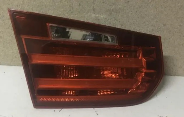 Lanterna BMW 320 tampa esquerdo motorista 
