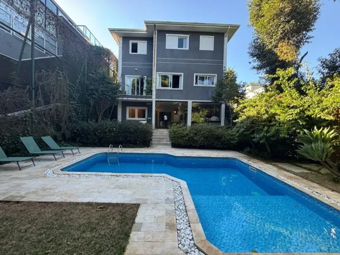 Golf Village - Casa com 4 dormitórios à venda, 290 m² por R$ 3.500.000 - Granja Viana - Ca