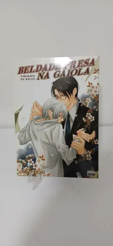 Mangá beldade presa na gaiola