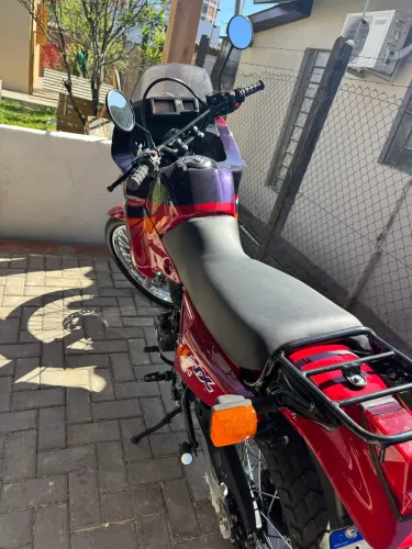 Vendo moto intacta com tudo ok! Toda conservada pronta para andar