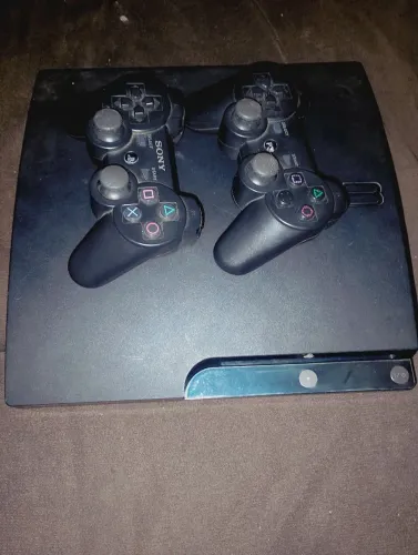 Vendo ps3 slim,ou troco por um ps4,com volta minha